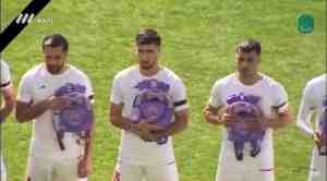伊朗队赛前全员手捧书包，悼念此前在空袭中丧生的上百名儿童